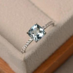 Silver ring with light blue stone SIZE 6